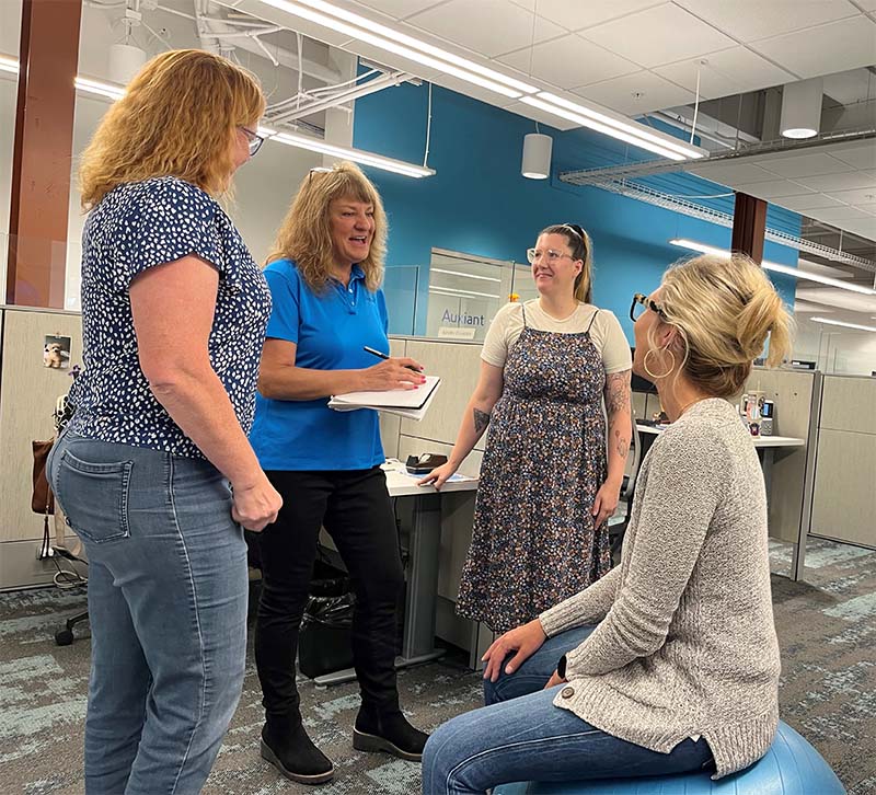 One of our experienced teams discussing their current project.